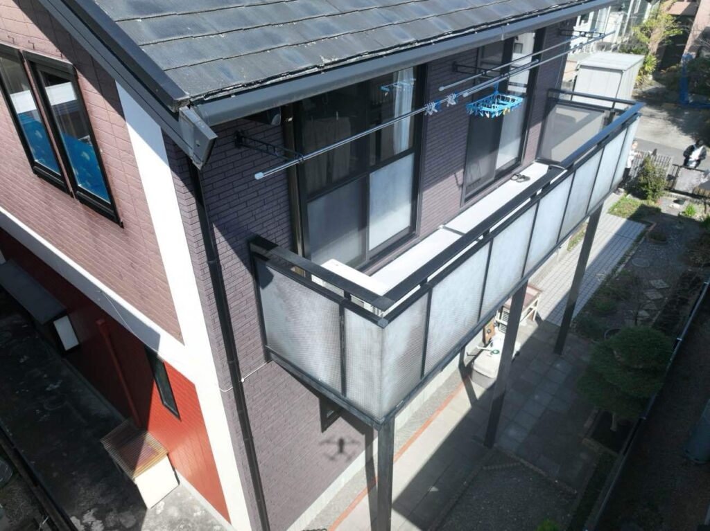 『外壁改修工事・ケイミュー株式会社 エクセレージ光セラ15 ベイカーブリック ドゥーロチタンダークレッド』津市一志町高野　K様